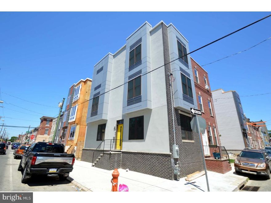 Price Improvement! Fantastic New Home in Point Breeze - Includes 3 bedrooms and 3 full baths, finished basement, 3rd floor master suite, wet bar and roof deck! First floor open floor plan flows upon entry with hardwood floors throughout the large living and dining area leading to the eat-in kitchen. Kitchen features modern white cabinetry, granite countertops and stainless steel appliances. Continue to the second floor to 2 bedrooms, full bath and laundry. The spacious third floor master suite has a modern bath with dual vanity, and tile floor. Enjoy the convenience of the 3rd floor wet bar before exiting to roof deck - perfect for entertaining. A full finished basement with full bath completes the home with additional storage and living space.