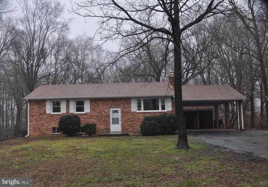 Great rental has fresh paint, new carpet and flooring, several appliances, new windows, new roof. Extra insulation put in attic as well to help make this house more energy efficient! Finished rec room in basement with bar and wood stove insert. Back yard backs to trees for privacy. Plenty of room! Currently zoned for North Point High School district!