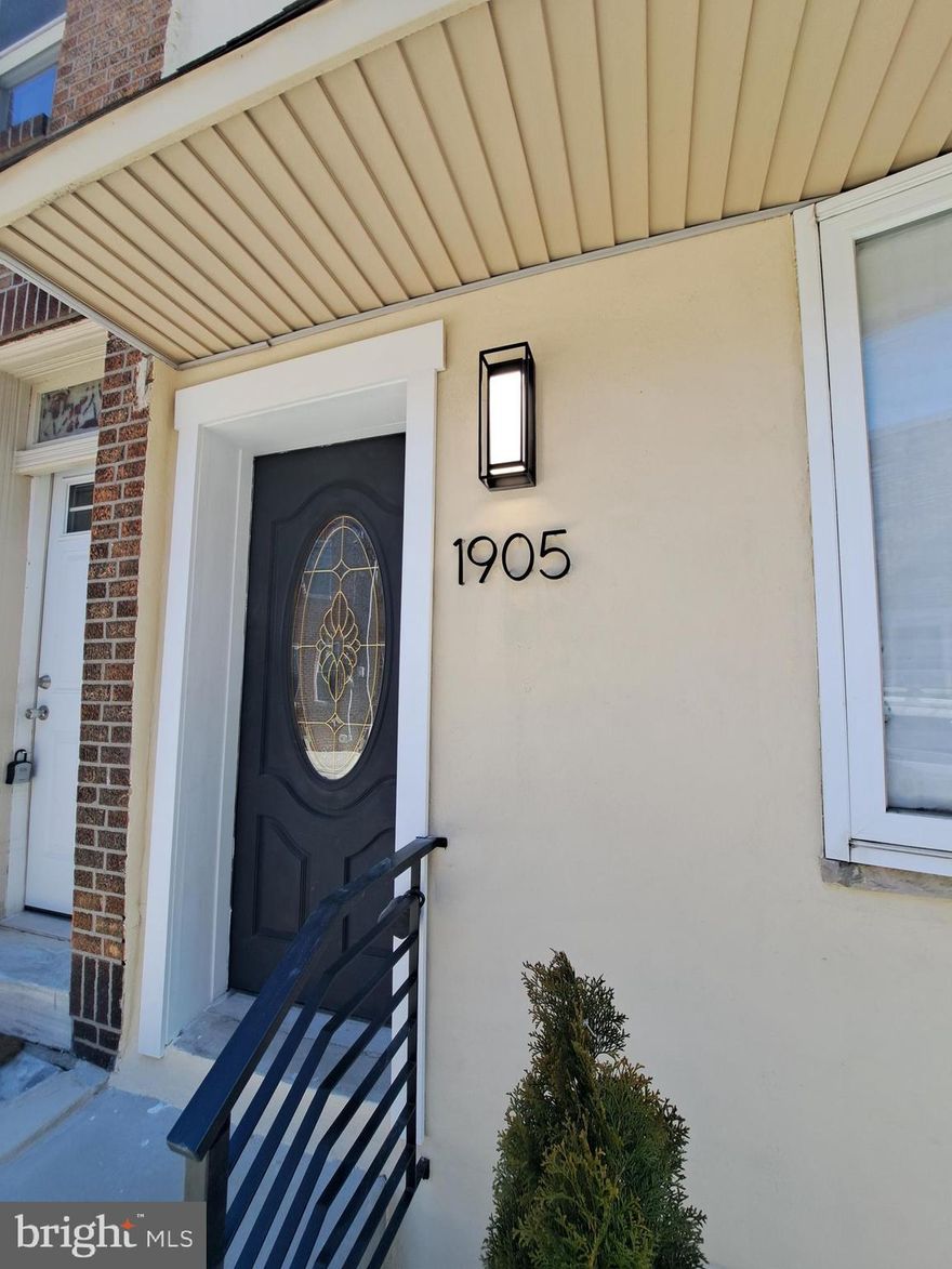 A complete and stunning renovation of the lovely turn of the century Norris Square townhome.  All new roof, new drywall, new contemporary wrought iron railings, new high efficiency heating and air conditioning system, new windows, two new luxurious full bathrooms, new sunlit kitchen with a huge European style window,  quartz countertop, new stainless steel appliances, all new premium flooring, all new electrical system with generous LED lighting throughout, all new plumbing system, all new doors and trim. This home features a resurfaced back patio with new natural wood fence, a cozy finished basement and a separate laundry.  Surrounded by many newly built and renovated homes and just a short walk from the exciting dining and shopping venues of infrastructure rich Fishtown, parks and transportation. The public tennis court is 1 block away.