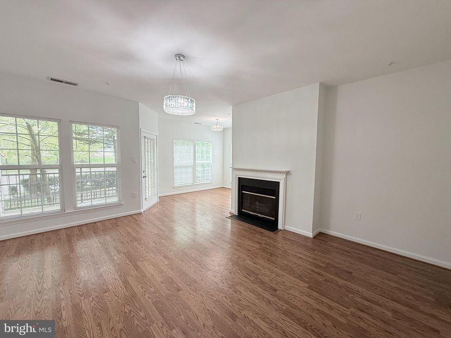 Pristine updated 2 bed/2 bath condo WITH GARAGE in sought after Random Hills! Enjoy one level living in this bright, move-in ready condo minutes from George Mason University and the City of Fairfax Historic District.  The open layout showcases the large, brand new Pella floor to ceiling windows. Natural light is key in this gorgeous. Newly renovated kitchen  with updated  stainless steel appliances ( 2017),   boasts quartz countertops and  durable vinyl flooring. Family room is spacious and centers around a gas fireplace. Enjoy the private patio and the extra storage space in utility closet. The separate laundry room with washer and dryer (replaced in 2015) includes extra storage space. Both bedrooms are spacious, have abundant natural light and their own walking closets. Each bedroom has direct access to its own full Bathrooms. All this minutes from Rt 50 and 66, convenient shopping like Fair Oak Mall, Whole foods, Costco, minutes to Shopping and dining areas at the Mosaic district, less than 15 min to Tysons corner, and all the amenities and great dining that Northern Virginia has to offer.