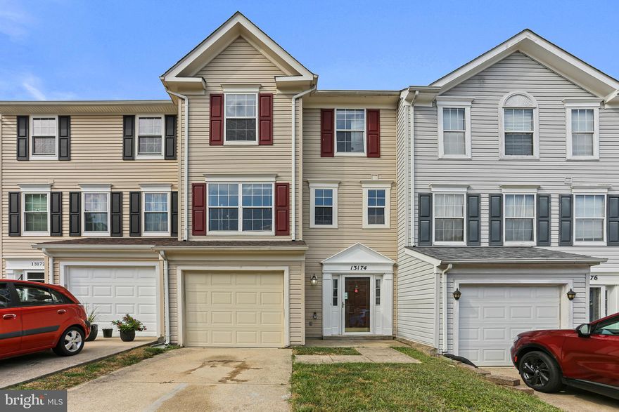 Back on market due to buyer financing falling through!  Welcome to 13174 Ripon Place - a beautiful 3 bedroom, 2.5 bath garage townhome in sought after Kings Grant!  The main living level has an open floor plan with gleaming hardwoods in the spacious living room and a light-filled kitchen with stainless steel appliances.  Continue upstairs to find the generous primary bedroom with en suite bath plus two additional comfortable bedrooms and full bath in the hall.  The entry level provides more space to work, play, or relax and features a cozy fireplace and sliding glass door leading to the back yard.  Enjoy covered parking and additional storage with the attached garage.  Desirable community with many amenities including walking trails, tennis court, racquetball court, and community pool all in a great location with easy access to major routes.  Home is in great condition, but being sold AS IS - seller will make no repairs.  Schedule your tour today or visit our OPEN HOUSE - Sunday 11/19, 12pm-2pm!