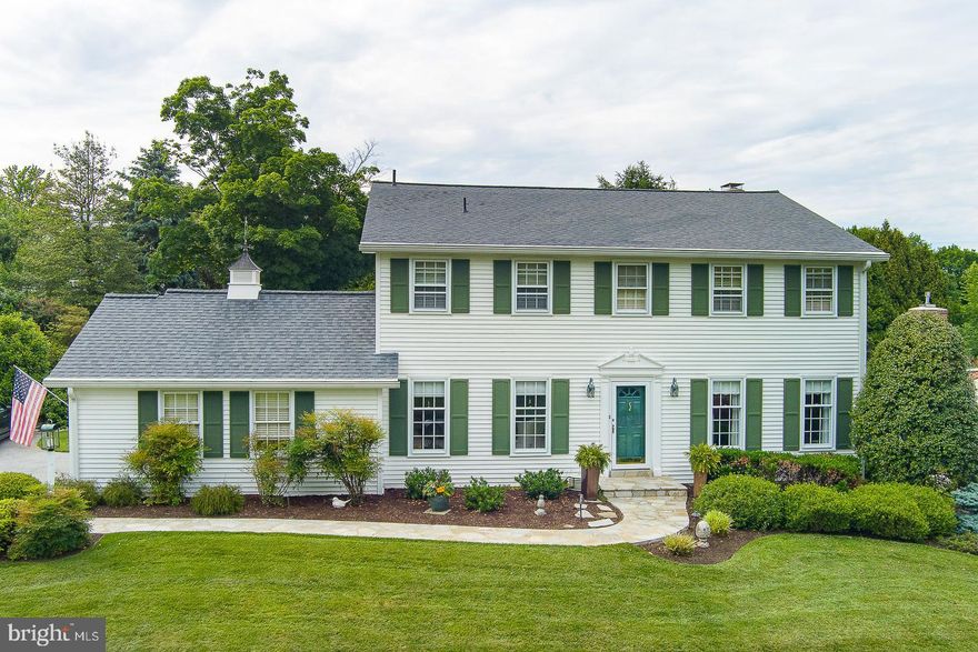 Elegant Parkside Living on Winston Way
Perfectly positioned across from TeeGarden Park in the highly acclaimed Tredyffrin/Easttown School District, serving New Eagle Elementary, T/E Middle School, and Conestoga High School, 495 Winston Way blends timeless Main Line charm with beautifully updated living in one of Berwyn’s most cherished neighborhood settings.

Set on a scenic and private 0.46-acre lot, this meticulously maintained 4-bedroom, 2.5-bath center hall Colonial offers 3,588 square feet of light-filled living space with soaring ceilings, skylights, hardwood floors, classic architectural detail, and a flowing layout designed for both everyday living and entertaining.

Known for its strong sense of community, Winston Way is the kind of neighborhood where neighbors gather for Halloween celebrations, Fourth of July parades, block parties, and year-round get-togethers. Just steps away, Teegarden Park offers walking trails, tennis courts, pickleball, a playground, a dog park, and expansive green space that naturally extends the neighborhood lifestyle.

At the heart of the home, the renovated kitchen combines classic style with modern functionality, featuring custom cabinetry, a large granite island, farmhouse sink, sunny breakfast area, and premium SubZero, Bosch, and GE Profile appliances. A brick gas fireplace, updated baths, gas heat, and central air add warmth and comfort throughout.

Designed for entertaining, the dramatic great room features soaring cathedral ceilings, skylights, and a custom wet bar anchored by a hammered copper sink, U-Line beverage refrigerator, and dedicated wine area. The seamless connection between the kitchen, great room, and outdoor spaces creates an inviting atmosphere for everything from intimate dinners to larger gatherings.

Originally designed as a five-bedroom home, the reimagined layout now offers an expansive primary suite with a custom walk-in closet by Closets by Design and a beautifully renovated spa-inspired bath.

Outdoor living is equally impressive with a pergola, retractable Sunbrella awning, outdoor stone fireplace, expansive deck, patio, and professionally crafted stone wall surrounded by mature landscaping and scenic views. The upper lawn provides exceptional usable space for recreation, gardening, play, or even future pool possibilities.

The partially finished basement offers flexible space for a media room, fitness area, playroom, home office, or recreation space, while the two-car garage adds convenience and additional storage.

Significant improvements include a renovated family room (2017), 30-year architectural roof with updated gutters, downspouts, and skylight flashing (2016), outdoor fireplace and hardscaping (2018), pergola (2019), HVAC system (2010), hot water heater (2021), and custom organizational systems throughout.

Few homes offer this balance of timeless character, modern updates, park-side living, and genuine neighborhood connection. Located just moments from Main Line shopping, dining, regional rail, and major commuting routes, 495 Winston Way offers a rare opportunity to enjoy elegant Main Line living where timeless architecture, modern comfort, and neighborhood connection come together beautifully.