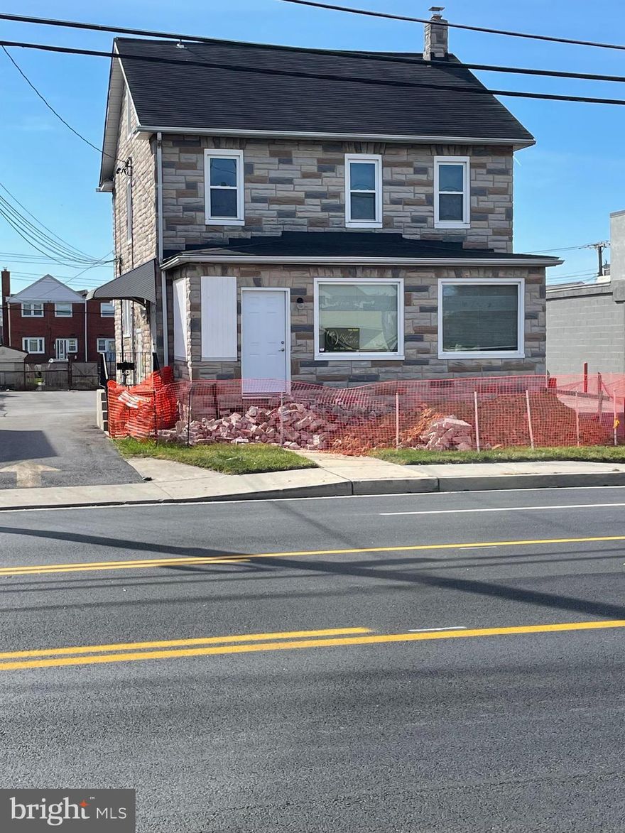 This is a real gem - owners are making all the necessary upgrades for handicap requirements for accessibility.  
Handicap ramp to entrance is now being built.  As you walk in you enter in a large  entrance/waiting room.  Then walk into another large room with 1/2 bath.  There are two large offices/rooms - one with handicap restroom.  You go down stairs is another room  that would be a great resting area for employees with 2 extra rooms off of it that would be great for storage.    Nice size kitchen for employees to enjoy their meals and relax.  Full bath room is also in the downstair area for employees to have private breaks.  The back lot is large for parking.  There is a front door w/ramp - a back door off of main level and another door in the downstairs to exit from.  Paint, clean and ready to go to make this a great opportunity to get your business off and running.
