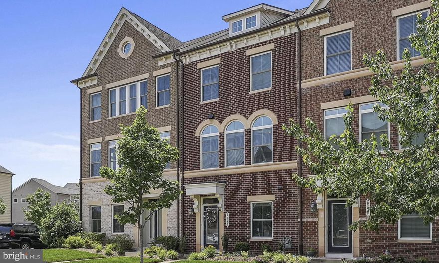 This rarely available, fully furnished 4-bedroom townhome offers the epitome of modern living in the heart of One Loudoun. Built in 2014, this stunning property is perfectly situated for both families and corporate rentals, with incredible walkability to the vibrant shops and restaurants of One Loudoun downtown.

This beautiful home spans three finished floors and features an expansive open layout, flooded with natural light. The main level's open living and dining area, complemented by an outdoor deck perfect for grilling and entertaining, creates an inviting atmosphere for residents and guests alike. The gourmet kitchen, equipped with gas cooking, a wall oven, pantry closet, ample storage, oversized island, and breakfast bar, is a chef's dream.

The upper level includes a conveniently located laundry room and three bedrooms, including an impressive primary suite. This suite boasts an office nook, two massive closets, and an en-suite bathroom, providing a luxurious retreat. The above-grade lower level hosts a recreation room and a fourth bedroom with a bathroom, ideal for hosting in-laws or guests.

The home's exterior features a charming brick facade and a spacious 2-car garage, combining aesthetic appeal with practical convenience.

Residents of this townhome will enjoy access to a host of community amenities offered by the HOA, including playgrounds, a basketball court, meeting rooms, an outdoor multipurpose court, tennis courts, pickleball courts, a dog park, a soccer field, sand volleyball courts, an outdoor pool facility, and an amphitheater venue for events. This community is renowned as the most fantastic in Ashburn.

The location is unparalleled, within the Steuart Weller/Belmont Ridge/Riverside school pyramid and offering exceptional walkability to numerous shops, restaurants, Alamo Cinema, Trader Joe's, and the Farmers Market. The property is just a 10-minute drive to Dulles International Airport and a 12-minute drive to Ashburn Metro Station, making it ideal for corporate professionals and families seeking convenience and luxury.

This home is currently being painted and furnished to ensure it is in pristine condition for its new tenant. It will be ready for occupancy from August 1st onward. Don't miss this opportunity to live in one of Ashburn's most desirable locations. For more information or to schedule a viewing, please contact the listing agent.