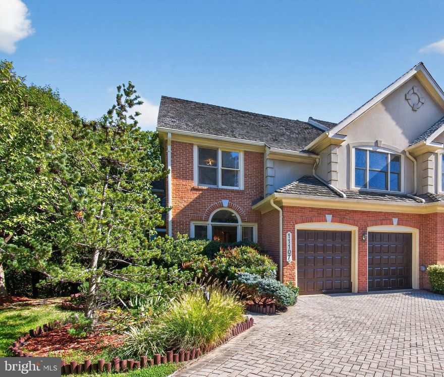 Open house canceled! House is under contract!
Nature lovers welcome! This beautifully appointed luxury duplex offers nearly 4,000 square feet of thoughtfully designed living space across three fully finished levels. Each floor has been carefully crafted to provide generous room for everyday living, entertaining, and relaxing in style.

The main level boasts soaring ceilings and expansive open spaces, creating an airy and inviting atmosphere. At the heart of the home is a striking two-sided corner fireplace that artfully separates the spacious living room from the family room and kitchen — the perfect setting for cozy evenings or lively gatherings. A tucked-away office behind French doors provides a quiet, private workspace ideal for working from home.
The family rooms opens to the 2 story deck overlooking park land- an ideal spot for morning coffee or evening relaxation.
Upstairs, you'll find four generously sized bedrooms and three beautifully renovated bathrooms. The serene owner’s suite features vaulted ceilings, large walk-in closet, and a luxurious en-suite bath complete with a deep soaking tub and walk-in shower. Three additional bedrooms offer comfort and privacy for family and guests alike.

The fully finished lower level includes an additional bedroom and full bath, perfect for guests or an au pair suite, along with walk-out access to a private patio.

A two-car garage includes an electric vehicle charger for added convenience. Mature landscaping surrounds the home, creating a peaceful retreat, and in the spring, you'll be treated to your very own cherry blossom magic.

Situated on a quiet cul-de-sac, the home offers both privacy and convenience. Enjoy a short walk to the Cabin John Shopping Center and an easy drive to Cabin John Regional Park. Commuters will appreciate quick access to Grosvenor Metro, I-270, and I-495.

This is a rare opportunity to experience comfort, style, and a connection to nature — all in one remarkable home.