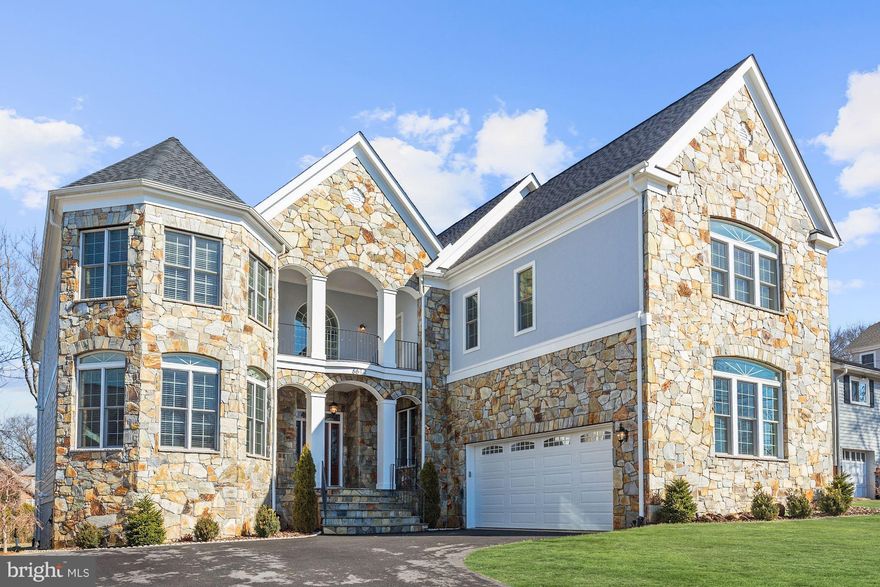 Better than new custom home! 10,000SF+ of lux living w/exceptional upgrades thru-out! Absolutely huge Chef's Kit w/2 isl. Walls of windows-Bkfst Rm & Family Rm opens to fantastic rear deck. Expansive upper level w/lux Master+4 BR & Laundry Rm. Main lvl BR Suite. LL Rec Rm, Billiards Rm, theater, 7th BR Suite, flex spaces & ample storage! Custom oversized gar w/built-ins & epoxy flooring. Must See!