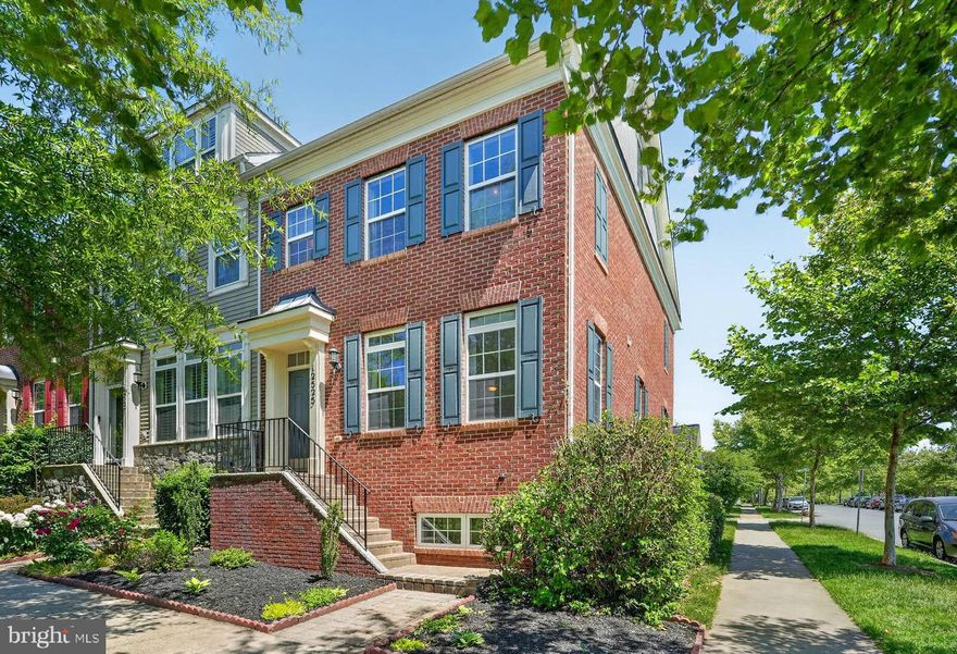 beautifully refreshed brick end-unit townhome  in sought-after Clarksburg Village offering three finished levels. An open floor plan, warm hardwood floors flow throughout the main level with natural light illuminating every space. The spacious chef's kitchen will delight with loads of cabinet space, granite countertops and stainless steel appliances. Upstairs you'll find the spacious vaulted ceiling primary bedroom with a walk-in closet. The primary bath features a double sink vanity, ceramic tile floors, soaking tub and separate shower. Down the hall are 2 additional bright and cheerful bedrooms each with plush carpet, high ceilings and drenched in sunlight sharing the updated hall bath. The expansive lower walkup level rec room with updated luxury vinyl plank floors offers a full bath and a den/additional sleeping space or an exercise room. The sprawling daylight filled recreation room is ideal for games, media, and relaxation. In the rear of the house, the paver patio is perfect for grilling and gathering with friends or for peacefully gazing at the stars at night. Adjacent to the patio, the two-car detached garage provides plenty of room for cars and additional storage space. Commuters will love the convenient location near I-270. Enjoy a variety of shopping, dining and entertainment experiences at Clarksburg Village Center and Clarksburg Outlets or take advantage of recreational opportunities at one of the areas parks or trails. It's the perfect home in a spectacular location