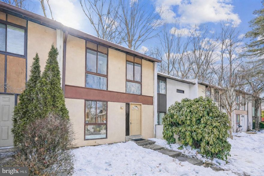 "NEW ON THE MARKET!"  3-Finished Level, 3 Bedroom + 2 Full Bath Townhome  *  NEW UPGRADED KITCHEN with Custom White Cabinetry, Updated Stainless-Steel Appliances, and Gorgeous Quartz Countertops! (2026)  *  Beautiful and Durable Main Level LVP Flooring  (2025)  *  BRAND NEW UPPER and LOWER LEVEL CARPETING!  (2026) *  Fresh Paint!  *   Recently Updated Baths  *  NEW Ducted Lennox HVAC System (2025)  *  Newer Asphalt Shingle Roof (2021)  *  NEW Full-Size Washer and Dryer (2023)  *  NEW Water Heater (2025)  *  Fenced Rear Yard with Patio BACKING TO TREES!  2 Reserved Parking Spots - and Much More!!!  *****OPEN HOUSE this SATURDAY, Feb. 14th, from 1:00 PM to 3:00 PM*****   "A Great Home at a Great Price...HURRY!!!"