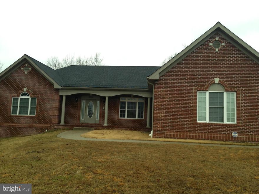 Back on the Market! Great Short Sale Opportunity.  Custom built home that shows like a model.  Gourmet Kitchen off Family room with Granite Viking cook top, double oven with all stainless steel appliances.  Private screened Sun room off kitchen. Master Suite has a fireplace, Jacuzzi, Dual Head Shower. Partially finished basement  with wiring, walls and bath rough in on almost a acre.