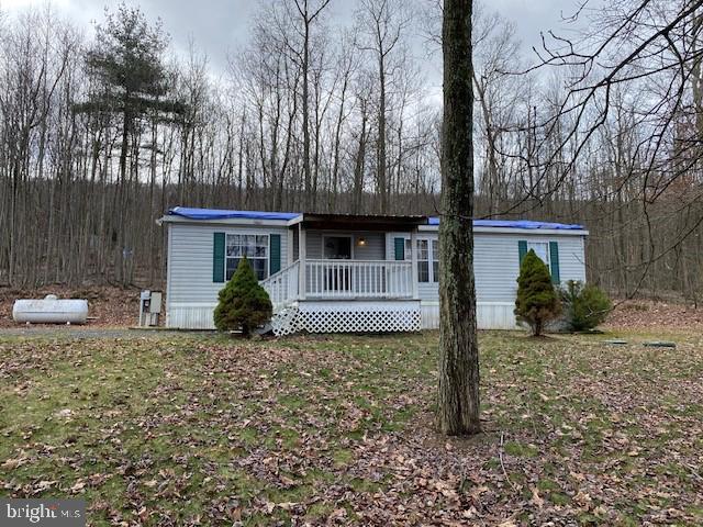 Nice 1.5 acre country lot yet close to major routes. Easy access to RT 11&15 and RT 22-322. Two full baths and main laundry are a real plus for any homeowner! Cathedral ceilings add to the open floor plan. This property has so much going for it and will make a beautiful home.  Potential buyers must have access to a local bank with money down, cash or have an available line of credit. The roof leaked while the seller was there and they had a contractor come and tarp/cover it securly so there would be no more leaks. There was no money to replace the roof and there is some ceiling damage from the leak so please be aware of that. Do not miss out on the opportunity to build instant equity with the purchase of this nice property.