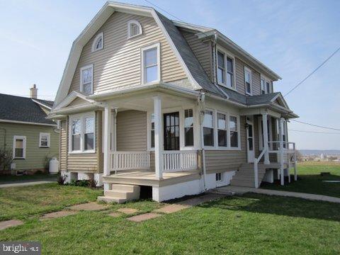 Completely renovated, new windows kitchen, paint exterior & interior, oil hot water heat, detached garage, level lot with farm views.