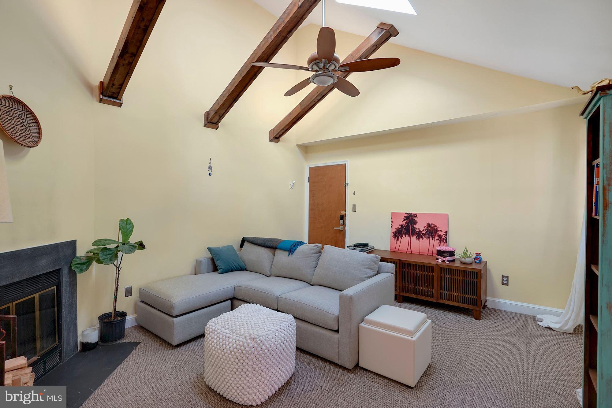 Palisade Gardens is a peaceful, pet-friendly community with tall trees and a park-like setting located just across the river from Georgetown and just down the street from quaint shops and tons of acclaimed eateries. This is a penthouse two bed, one bath condo with special touches including a wood burning fireplace in the living room with cathedral ceilings, exposed wood beams, and skylights for tons of natural light. The renovated kitchen with granite counters, stainless steel appliances & maple cabinetry is open to the living space and has views of the beautifully landscaped courtyard. In the more private space to the rear of the condo are two gracious bedrooms with large closets and a bathroom with a tub shower. For extra storage there is a large walk-in attic. One permit parking space. Just a short few blocks to Mom's Organic Market, and then on to Clarendon all the shops ands restaurants you could ever possibly need. The location is outstanding; the commute to anywhere in the Washington area is easy and quick! Bikeshare, restaurants, shops, Rosslyn and Courthouse Metros are all only a stone's throw away as is Georgetown. Fabulous unit - unbeatable location. This is the perfect condo to call home!