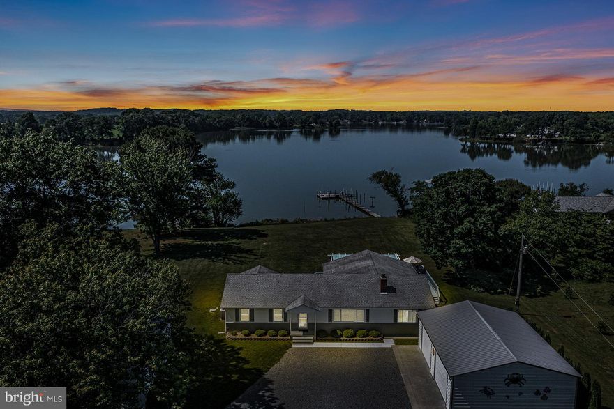 Meticulously maintained, One level Waterfront Home on Lower Machodoc Creek, one of the best creeks in the Northern Neck! Enjoy beautiful Sunrises/sunsets and wide water views from this well laid out home. Situated perfectly on 1.4 acres with a nicely manicured yard! Enjoy water views as soon as you enter the light and airy interior ! Enjoy Breezes from large wrap around deck! The interior boasts 2,200 sq ft, an open floorplan, newly updated Kitchen with stainless steel appliances plus quartz counters along with custom Cabinetry, Italian Porcelain Floor Tiles, Gorgeous Wood floors, waterside Primary Suite with access to the waterside deck, Renovated Primary Bath, 2 Guest Bedrooms, a Flex Room for an office or potentially 4th bedroom, waterside Great Room with lots of glass, Living Room with Gas log Fireplace. Other great highlights: unique deck pergola, Tankless water heater, all New Windows, New HVAC, Climate Controlled encapsulated crawlspace, & More ! Loads of storage including a 37' x 28' garage with two oversized 9x12 two garage doors, 20x 15 garden shed, and a large 2 story building great for a workshop or convert to a guest house. Great water Location and elevation with rip-rap shore, a pier, boat lift, 2 jet ski lifts and rare deep water of 7-9 feet which will accommodate any boat. Schedule a showing of this fine property soon!