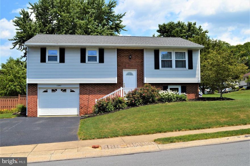 Don't miss this adorable home on a large corner lot!  Enjoy the nicely landscaped yard from your covered deck.  Newer roof and windows.