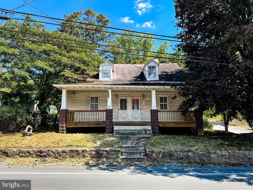Bring your tools and your vision to this 1,488 sq. ft. cape cod ready for transformation! This 3-bedroom, 1-bath home offers a functional layout with main-level laundry, a spacious living area, and a great front porch perfect for relaxing after a day’s work. The large yard provides plenty of space for outdoor living, pets, or future landscaping projects. A detached garage sits at the rear of the property and includes a one-bedroom apartment above — ready for a full rehab. This extra space offers excellent potential for guest quarters, rental income, or a home office once restored. With its charming curb appeal, this home has solid bones and plenty of character, making it a prime candidate for renovation, resale, or a 2 unit long-term rental hold. This property is being sold as-is — a great opportunity for cash buyers or those using renovation financing to build instant equity. Schedule your showing today and start planning your next project!