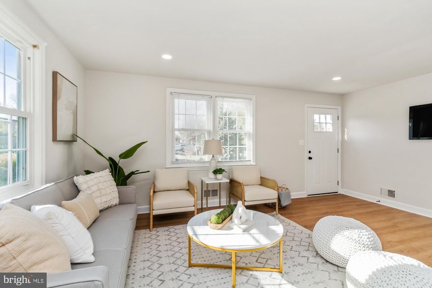 Welcome to this stunning, fully renovated 4-bedroom, 2.5-bath home, nestled on a flat, fully fenced lot! Step inside to discover modern LVP flooring throughout, leading you to the heart of the home—a gorgeous kitchen featuring crisp white cabinets, stainless steel appliances, quartz countertops, and a spacious peninsula perfect for bar seating. The large dining room, complete with sliders, opens to a generous deck, ideal for outdoor entertaining. The entry-level boasts a spacious primary suite with an ensuite bath, complete with a walk-in closet and stand-up shower, plus two additional bedrooms and a beautifully updated hall bath. The fully finished lower level offers a cozy family room, a 4th bedroom, a convenient half bath, and a large laundry/storage room. This home has it all—style, space, and a great location! Don't miss out on this incredible opportunity!