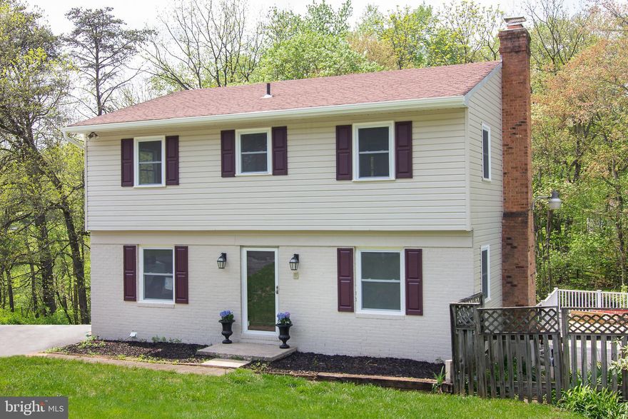 Completely renovated 4Br, 2/2 Bath Colonial home in Eldersburg convenient to everything. 4 large bedrooms and 2 full baths on 2nd floor. All bedrooms have beautiful hardwood floors. New master bathroom with new vanity, tile floors and gorgeous walk-in shower with glass door. Hall bathroom has new vanity and toilet and beautiful bathtub/shower. The first floor renovation included a large beautiful new kitchen with new hardwood floors, soft close cabinetry, recessed lighting, high end stainless steel appliances-refrigerator-dishwasher-oven/stove & built-in microwave oven. Beautiful new granite countertops and sink. The dining room was eliminated to become part of a huge eat-in kitchen with new hardwood floors. Also on the first floor is a new powder room with a beautiful modern vanity top.  Hardwood floors in the hallway and in the living room with new recessed lighting and a first floor office with hardwood floors and exit to a new deck and pool area.  New handrails and newel posts on both staircases. The lower level family room is all new with an existing wood burning fireplace with wood stove insert, new powder room, new carpet and new slider door exit. LL laundry room is also renovated.  If you want a gorgeous in-ground pool this is it.  9' deep with new decking surrounding pool. Pool has been professionally opened and tested with new pumps and piping.  All windows, vinyl siding and shutters, gutters and 200 amp electric service are new and the entire house has been painted. Backs to trees and stream. Very convenient to Rts 32, 26, 795, 695 & 70