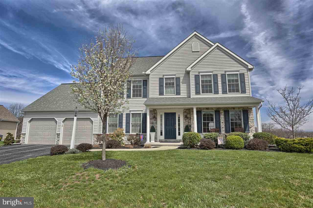 Superb home on a level lot with great view of the surrounding countryside. Original owners have maintained home in fantastic condition and hate to leave this wonderful home. Enjoy the great views from the stamped patio and be in time to enjoy the blooming rose bushes. Basement has superior walls and is roughed in for electric so drywall and carpet is all that is needed. Do not miss this opportunity on a great house.