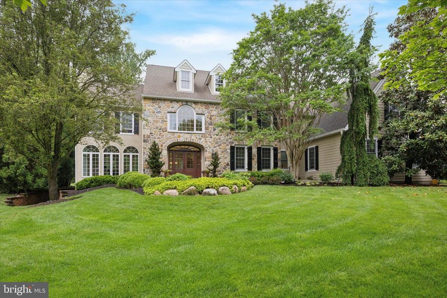 Welcome to 5 Greystone Circle, a meticulously maintained home tucked away on a quiet cul-de-sac in the sought-after Springton Reserve community. From the moment you enter the impressive two-story foyer, you'll be struck by the natural light. The formal living and dining rooms feature oversized windows, creating bright and inviting spaces ideal for both everyday living and entertaining. At the heart of the home is an open kitchen featuring custom cabinetry, an eight-and-a-half-foot island, commercial-grade appliances, a bar area, and a sunny breakfast room with expansive views of the nearly one-acre yard. The floor plan flows seamlessly into the spacious family room, featuring a gas fireplace with a floor-to-ceiling stone surround. The main level also includes a dedicated home office with custom built-in cabinetry, a well-appointed mudroom with built-in cubbies for organization, a laundry room, and two powder rooms for added convenience. Upstairs, the luxurious primary suite features dual walk-in closets and a completely renovated spa-like bathroom with a soaking clawfoot tub. Four additional generously sized bedrooms complete the second level—two with ensuite baths and two that share a Jack and Jill bathroom. There is also a walk up unfinished attic that can easily be refinished for additional space or used for extra storage. The finished portion of the basement adds even more living space and includes a full bathroom - ideal for a playroom, home gym, or guest suite. The unfinished area is perfect for extra storage. Additional highlights include an oversized three-car garage with wall to wall built-in organization systems. A rear patio with a built-in firepit, a sprinkler system, a shed that is equipped with electric and beautifully maintained landscaping throughout the entire property. Located just minutes from downtown Media, The Shoppes at Ellis Preserve, Whole Foods, Ridley Creek State Park and Rose Tree Park. The home also has easy access to major routes and is an easy commute to Philadelphia. It truly is the perfect blend of peaceful living and everyday convenience! Don't miss out—schedule your showing today!