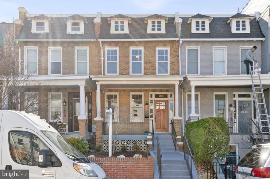 Modern conveniences and energy efficiency meet timeless charm in this updated rowhome nestled in popular Park View. You'll instantly notice the great curb appeal with fresh landscaping with welcoming front porch. Once inside, the timeless character of the home shines through with refinished original hardwood floors upstairs on main and upper levels, tall ceilings, exposed brick, detailed trim work around all the doors, and decorative fireplace in the dining room. The main level also has a separate dining room and large kitchen featuring stainless appliances, upgraded countertops, and coffee bar for additional storage space. There is also easy access to your private outdoor oasis with a large patio, area for grilling, flower and garden beds, and new tall fencing for privacy. The upstairs bedrooms feature original working transoms, where you can relax in your expansive primary bedroom suite complete with an organized walk-in closet and bonus room to use as a home office, workout area, or for additional storage. The front bedroom is spacious and bright, the neighboring hall bathroom has a functioning skylight. The versatile lower level can be used as your third bedroom or additional living space, and also has a full bathroom and an LG washer and dryer that were installed in 2020. This home boasts an impressive range of upgrades and improvements completed in the last five years including OWNED SOLAR PANELS that provides an annual credit from Pepco, Velux Skylight in the bathroom with a rain sensor for automatic closing, and a new high-efficiency on-demand boiler installed in 2020.  The home is fully equipped with several smart home features, including Lutron smart switches paired with LED recessed lighting, adding both sophistication and convenience, plus Ecobee smart thermostats, and smart blinds throughout the home. You're conveniently located near Petworth Metro, popular dining hot spots, DC USA shopping center that is home to Target, Giant & Best Buy, multiple hospitals, parks, and easy access to North Capitol Street for easy commuting throughout the city.  This rowhome combines the best of modern upgrades with classic rowhome character—perfect for those seeking style, comfort, and sustainability. Check it out today before it's too late!