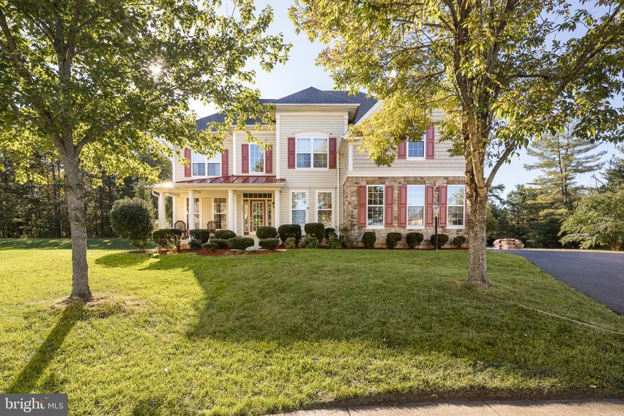 Rare opportunity to own a special home in the coveted Vint Hill Farms community.   Loaded with curb appeal, this 4,200 square foot beauty with a premium lot upgrade is tucked away in a quiet cul-de-sac of the well loved neighborhood on the D.C. side of Warrenton.  You will want to call this little slice of heaven your own once you take in the warmth and inviting atmosphere the home has to offer.   The freshly landscaped walkway leads you to an oversized front porch.  Features inside include a 2 story foyer, main level office, hard wood flooring in foyer, on staircase and on top level hallway, private laundry room hallway off the kitchen, stainless steel appliances, 2-story family room with palladium window, back staircase hard wood floors.  There is also a bonus room on the top level in addition to the 4 bedrooms.  The fully finished basement has new carpet and comes complete with a second kitchen, a second washer/dryer set, full bath, bonus room, workout room, huge rec room and separate entrance to the outside.  Makes a great separate living suite!  The large back yard has a beautiful view of trees - nothing but green when you look out your back windows!    There is no shortage of things to do in Vint Hill Farms.  Old Bust Head is a favorite brewery/bar among the locals.  Enter one of the corn-hole tournaments they're known to have! There are 2 cafes, a small theater, a dog park, a Veteran Hospital, and The Vint Hill winery.  There are also several ball fields, plenty of open space and a swimming pool in the community.   Shopping, dining, and major roadways are very close by as well!  Hurry - won't last long!  **See Zillow 3D tour link by clicking on the video camera icon at top of screen