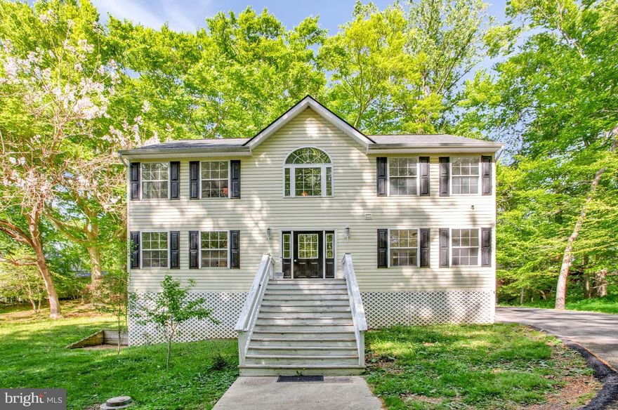 Welcome to this spacious and light-filled home in this sought-after Saint Leonard community! Featuring 3 bedrooms, 2 full baths, and 2 half baths, this well-maintained property offers both comfort and room to grow.

Step inside to a stunning two-story foyer that creates an inviting first impression and sets the tone for the airy feel throughout. The main level offers a generous family room, a dedicated dining space, a convenient half bath, and a kitchen with ample room for a breakfast table—perfect for everyday living and entertaining.

Upstairs, you’ll find three generously sized bedrooms, including a sun-drenched primary suite complete with a walk-in closet and private en-suite bath. Two additional spacious bedrooms and a full hall bath complete the upper level.

The walk-out basement adds even more potential, already framed with walls and a half bath in place—just bring your vision and finishing touches to make it your own.

Recent updates provide peace of mind, including fresh paint (4/2026), new carpet (4/2026), and newer major systems such as the roof (2024), HVAC (2025), washer and dryer (2026), water heater (2024), and newer refrigerator.

Outside, enjoy being part of a beautiful community just blocks from the Chesapeake Bay. With membership to the Long Beach Civic Association (voluntary, $100/year) and mandatory road fees ($75/year), you’ll have access to private community beaches where you can kayak, fish, and swim! Boating enthusiasts will also appreciate the nearby Flag Harbor Private Marina, offering slip rental or purchase options.

This home offers the perfect blend of space, updates, and coastal lifestyle—don’t miss your chance to make it yours!