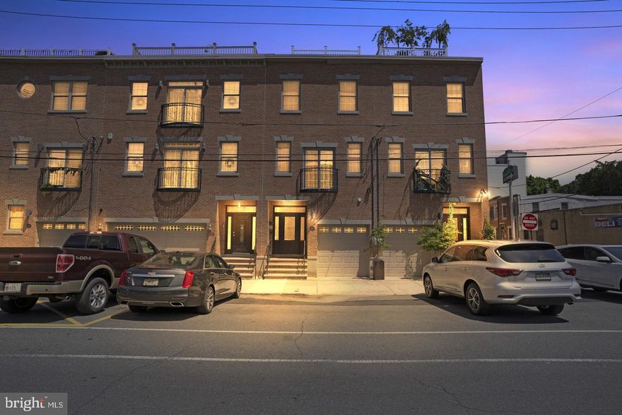 Available for rent now! This stunning 3 bed, 3 full and 2 half bath townhome with garage parking and an additional reserved on street parking spot! Entering the home you will notice the high end finishes and luxurious custom design keeping comfort & class in mind. Gorgeous dark wood custom gourmet kitchen with large island, stainless steel appliances, 5-burner stove, and soft close cabinetry. 9' ceilings and light maple hardwood flooring throughout the large living & dining room, make it the perfect space for entertaining. The main bedroom has a luxurious on-suite bathroom with walk-in shower, frameless glass doors, jacuzzi tub, and his and hers closets.Large rooftop deck with city skyline views of both the Benjamin Franklin Bridge and Walt Whitman Bridge. Dual zone high efficiency HVAC systems for equal comfort on every floor. Finished basement makes a great den or media room, with a powder room and laundry room. Close to 95!  Pets welcome with additional deposit!