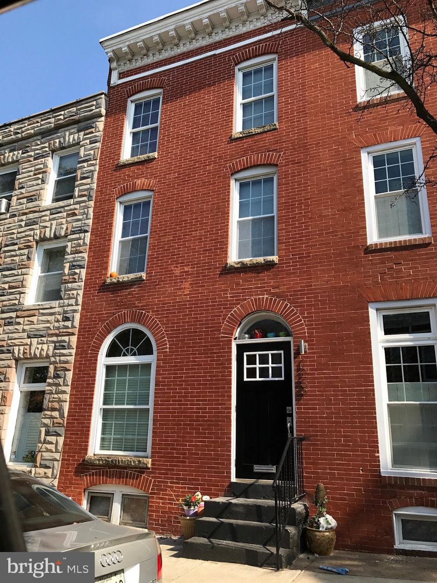 Amazing 2nd/3rd floor apartment centrally located in federal hill. Main floor has a large living room with exposed brick and hardwood flooring. Updated kitchen with laundry. Updated full bathroom and a bedroom/office. Upper level features two large bedrooms. 2/3 tandem parking in the rear.