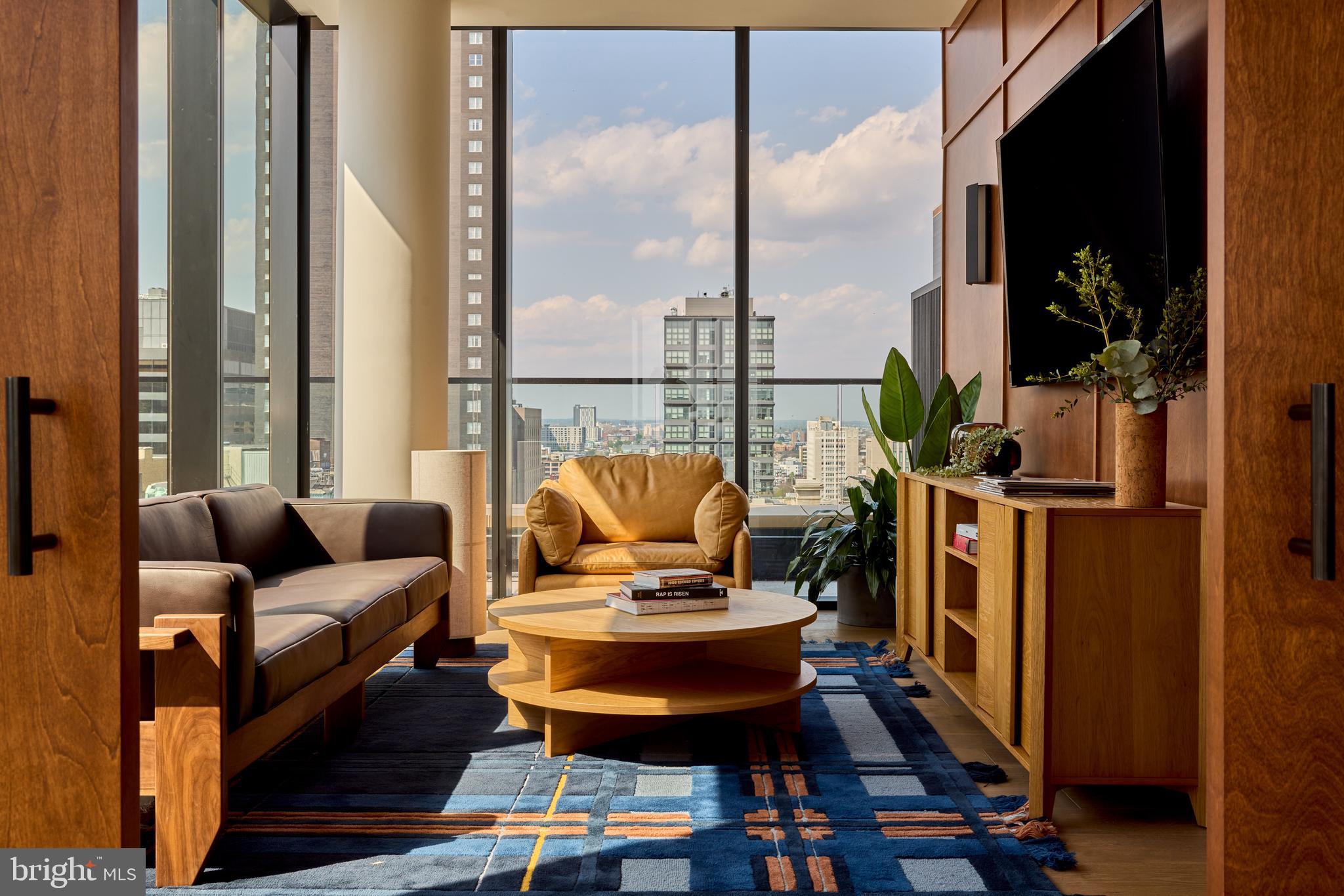 The Jessup House, nestled in the heart of Philadelphia's vibrant Center City, offers an unparalleled living experience that blends modern luxury with urban sophistication. Located at the corner of Sansom and 12th Street, this stunning high-rise apartment community caters to those seeking the perfect balance of elegance and city energy.
The property features a curated collection of studio, one, two, and three-bedroom apartments, as well as exclusive penthouses, each designed to meet the discerning tastes of Philadelphia's urban dwellers. Residents can choose from two exquisite kitchen finish sets, personalizing their space to reflect their unique style.
Life at The Jessup House is characterized by convenience and indulgence. Amenities include an expansive, fully-equipped fitness center, a rooftop pool with breathtaking city views, and a rooftop terrace complete with fire pits and outdoor kitchens. For those working from home, both open-concept and private coworking spaces are available. Pet owners will appreciate the dedicated pet spa and outdoor dog run.
The Jessup House's prime location puts residents at the epicenter of Philadelphia's most dynamic neighborhood, with easy access to diverse restaurants, trendy boutiques, and exciting nightlife. Commuting is a breeze, with three train lines just two blocks away and on-site parking available.
Inside each apartment, residents enjoy luxurious features such as chef-inspired kitchens with high-end GE appliances, soft-close cabinets, and quartz countertops. Floor-to-ceiling windows flood the living spaces with natural light, while private balconies and terraces offer personal outdoor retreats with stunning city views. Spa-inspired bathrooms and in-unit washers and dryers complete the picture of modern, upscale living.
The penthouse units at The Jessup House take luxury living to new heights, offering expansive floor plans and high-end finishes. These premier residences feature chef-inspired kitchens with Bertazonni gas ranges and Fisher & Paykel refrigerators, spacious living areas with premium hardwood flooring, and spa-inspired bathrooms with frameless glass showers and luxurious soaking tubs. Large terraces or balconies provide the perfect outdoor retreat, while high ceilings and smart home technology add to the sense of grandeur and convenience.
The Jessup House isn't just a place to live; it's a lifestyle choice that reflects the vibrant, sophisticated character of its residents. Whether you're hosting a dinner party in your elegantly appointed apartment, collaborating with neighbors in the coworking space, or exploring the myriad of experiences that Center City has to offer, life at The Jessup House is an ever-unfolding adventure in urban living at its finest.
** Pricing and availability subject to change on a daily basis ** Photos are of model units ** Parking may be available for additional fee **