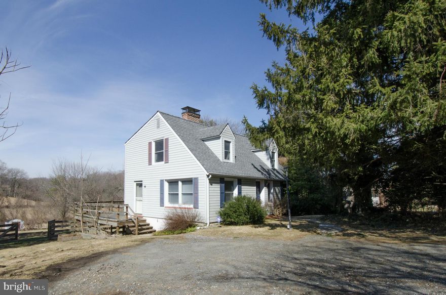 Wood burning fireplace in living room, oak floors, separate dining room, main floor bedroom/study, & kitchen with eating area. Wood deck overlooks expansive 4-board fenced1.26 acre rear yard w/ view of countryside. Bsmt could be finished for additional space. Updated roof, shower, furnace & septic but needs TLC.