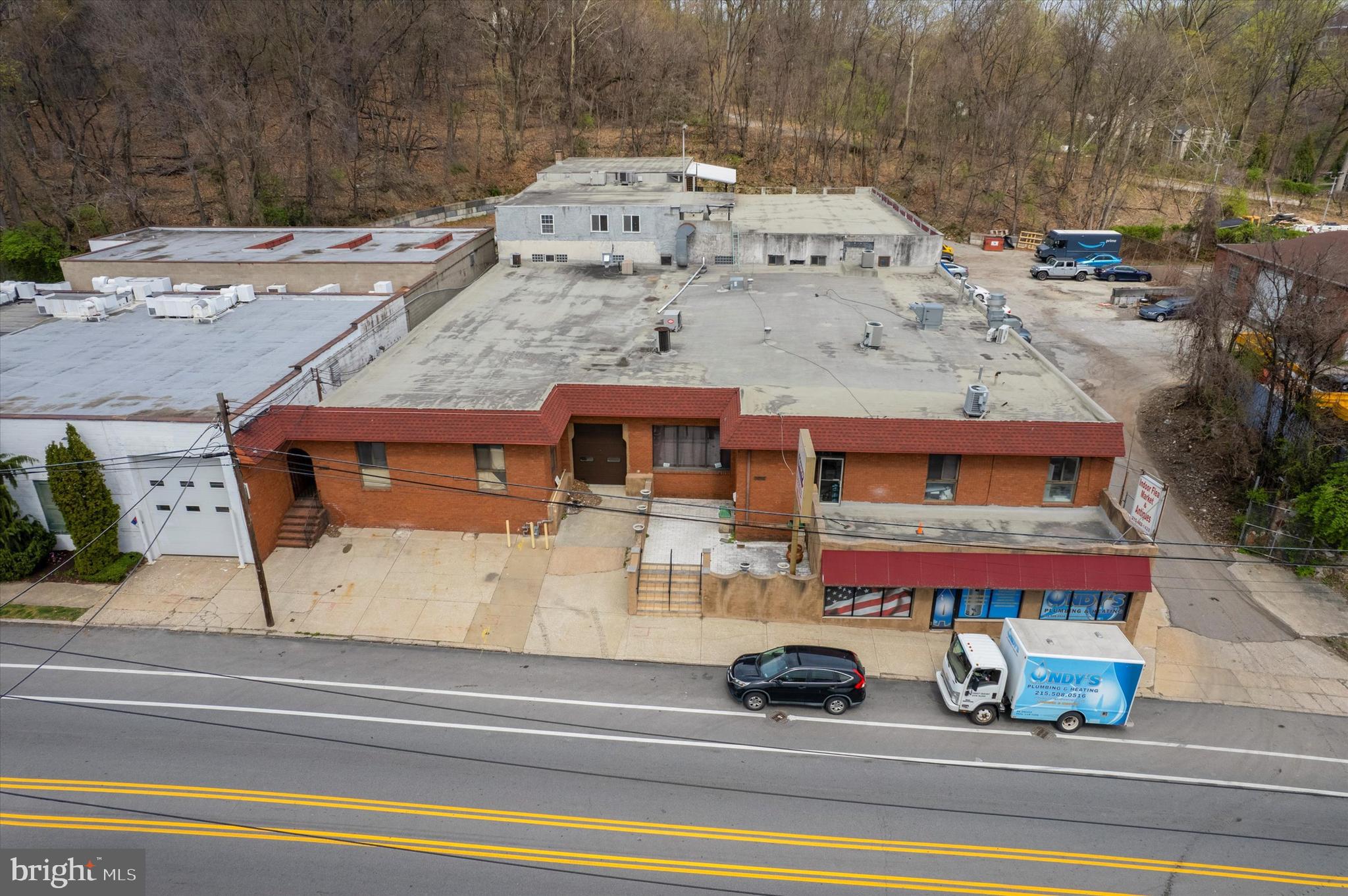 Welcome to 5091 Umbria St. Philadelphia! This 28,418 sq ft warehouse features seven individual spaces, five of which are leased out on Triple Net Leases with an annual increase of 3% per year, while two are owner-occupied. Floor plans are available. For more information and copies of leases, please reach out today. The potential here is exciting!