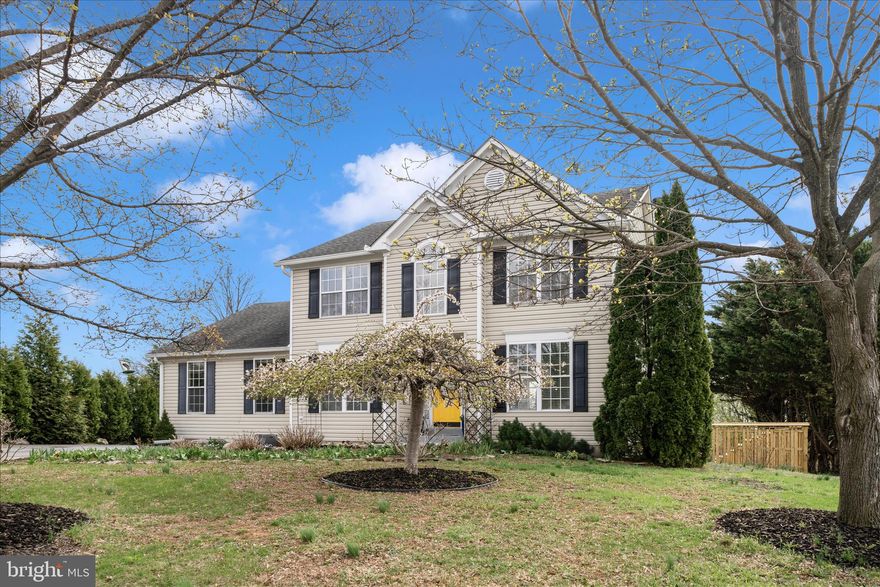 Beautifully appointed and rich with upscale finishes—from striking tilework to rich flooring sourced from around the globe, this exceptional home offers a versatile floor plan designed for modern living. Set on a private, gorgeous landscaped half-acre lot, the property features an inground pool, expansive deck, custom fencing, and an expansive heated/air‑conditioned detached two‑car garage—your own personal retreat just steps from Main Street. Thoughtfully designed for multi‑generational living or simply added convenience, the home includes two primary suites—one on the main level and one upstairs—along with multiple options for dedicated office spaces.   The main level with 9' ceilings includes a primary bedroom with adjoining full bath, an additional bedroom/office with built-ins, formal dining room, office and half bath.  The light-filled family room with sweeping windows flows seamlessly to the kitchen with breakfast area, cream cabinetry, quartz countertops, marble backsplash, and two pantries - one fitted out for the perfect coffee bar. This level finishes off with a fully-equipped laundry with automated drying rack. 
The upper-level primary suite includes a 7x14 walk in closet with built ins, a second closet and a stunning spa-like bath with oversized shower, stand-alone tub, and dual sink vanity.  This level also offers two additional bedrooms serviced by a full bath.  
The finished walkout lower level adds even more living space with a recreation room and wet bar, full bath, exercise room, and an additional office/den.  Many items in the home convey such as the exercise equipment, shelving, pool table, outdoor furniture and more - see Inclusions/Exclusions!
Located on a quaint side street in Damascus walking distance from Main Street with shopping and restaurants.  Don't forget to stop for a Jimmie Cone.  Convenient commuter location with short drives to either I-270 or I-70 and Shady Grove Metro.