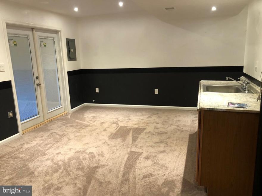 This is a basement only for rent.  All utilities including internet is included**** for ONE PERSON only.   A Living Room area with Kitchenette cabinet, sink, microwave, and a fridge.  A Full bath and a bedroom.  Walk out basement to a Private exit from rear.  It also has a Patio for grilling and fenced yard with beautiful views.  Shared laundry.  The owner lives upstairs. One assigned parking in front of the unit is included in the rent.   Close to Mall, Shopping , I-66, Fairfax county parkway.  Grocery store and Cafes and much more* Parks and trails walking distance.  NO PETS NO SMOKERS