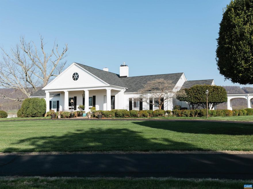 A breathtakingly beautiful 86 acre Keswick area farm nestled up against the Southwest Mountains.  The well-proportioned residence and accompanying outbuildings are sited to take in views in every direction. The home was thoughtfully renovated in 2001, retaining its original character including floor to ceiling wormy chestnut paneling in the study.   There is a guest cottage, small stable, gym on the property as well as impeccably maintained fields, and fencing. Not under conservation easement but surrounded by protected land. 25 minutes from Charlottesville.,Solid Surface Counter,Wood Cabinets,Fireplace in Living Room,Fireplace in Study/Library