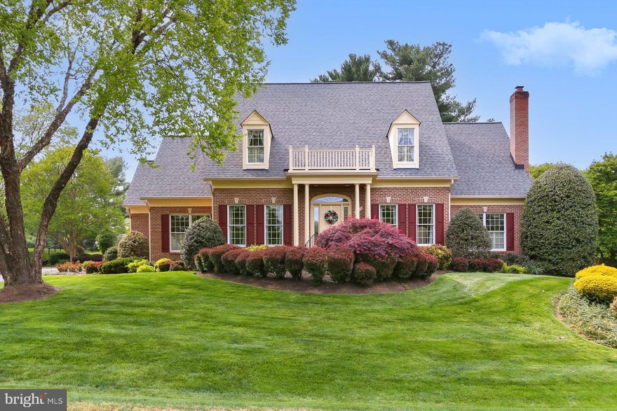 Nestled in the beautiful and sought-after Hunting Hills of Oakton, this truly remarkable .8-acre estate offers exceptional design, privacy, and fantastic location. This is a four bedroom all brick residence that offers an exceptional open floor plan. This home was built by Randolph Williams. The extensive landscaping and hardscape offers a private patio as well as open backyard space. A light-filled foyer welcomes you to the home. The living room, just off the main entrance, features a lovely light filled room. The library/office highlights a lovely gas fireplace with a beautiful view of a most magnificent sycamore tree! There is also a half bath just beyond the open foyer. To the left of the entrance is a marvelous dining room where there is room for so many! The open floor plan concept is evident in the living spaces here on the main level especially the family room that is 17’ X 17 with a two-story brick fireplace with two French doors that open to the brick patio. The kitchen is thoughtfully designed with a generous island that accommodates additional seating and the gas cooktop, ample table space, an office-nook, a large pantry, and an abundance of cabinets. A half bath, laundry room and door leading to the garage are right off the kitchen. The immense primary bedroom is tucked behind the family room and is off the library. The bay window overlooks the beautiful landscaping. The primary bathroom is open and spacious with a double vanities, soaking tub, and glass enclosed shower stall. The open stairway leads you to 3 large bedrooms with generous closet space and another full bathroom. There are two staircases that lead to an expansive lower level with rough in for another bathroom. It is only minutes to Starbucks, restaurants, shopping, community park, and library. Minutes to major commuter routes and only 13 miles to Dulles Airport. Oakton High School Pyramid in sought after Fairfax County Schools.