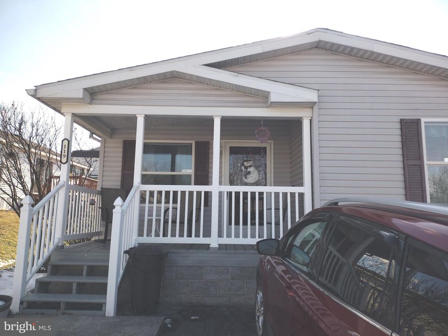 Move in condition! One level living offers 3 bedrooms, 2 full baths and fully equipped kitchen and laundry room. Nice covered front porch, side deck, and shed conveys.