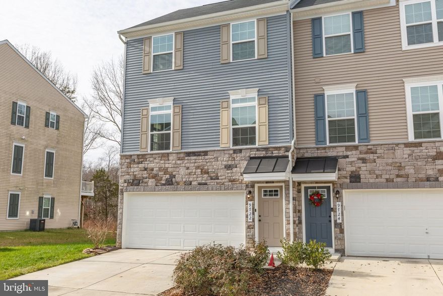 Don’t miss your chance to experience modern living in this stunning end-unit townhome at Wheatland Station, where community amenities like a sparkling pool and playground are just steps away. Perfectly located only half a mile from the VRE, with easy access to I-95 and minutes from a variety of shopping, dining, and local restaurants, this home offers both convenience and comfort. Inside, the finished basement provides a versatile living area with a full bathroom and walkout access to the fenced backyard—ideal for guests or recreation. The main level features an open floor plan with a beautiful 10-foot kitchen island, stainless steel appliances, a gas range, and a half bath, plus a spacious back deck overlooking scenic woods for added privacy and relaxation. Upstairs, you’ll find a generous primary suite with a walk-in closet and a luxurious ensuite bathroom with a soaking tub and walk-in shower, along with two additional bedrooms, another full bathroom, and a separate laundry room. Additional highlights include an attached two-car garage, end-unit privacy, and a location close to everything—this Wheatland Station home truly has it all, so schedule your private tour today!