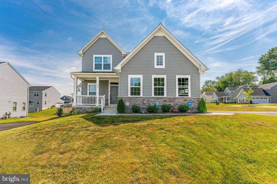 Welcome to 208 Sloan Drive, a stunning single-family home built in 2023, situated on a desirable corner lot in Coatesville. This beautifully designed 4-bedroom, 2.5-bath residence offers the perfect blend of modern luxury and comfortable living. Step into a welcoming living room featuring recessed lighting, plush carpeting, and elegant luxury vinyl plank flooring that flows seamlessly from the front door back to the kitchen. The kitchen boasts quartz countertops, a spacious island, all stainless steel appliances, a pantry closet, and a stylish subway tile backsplash. The adjoining breakfast room is perfect for casual dining. Relax in the cozy family room with a charming fireplace, ideal for gatherings. A convenient powder room and access to the 2-car garage complete the main level. The primary bedroom on the upper level is a true retreat, featuring two walk-in closets and an en-suite bathroom with double sinks, a tiled floor, and a beautifully tiled shower. Three additional bedrooms provide ample space for family and guests. A dedicated laundry room and a full bathroom enhance the functionality of the upper level. The finished basement offers additional living space, perfect for a great room, home office, or entertainment area, while an unfinished utility room provides excellent storage options. Located across the street, you’ll find an array of community amenities including a pool, common areas, a dog park, walking trails, and a sports field, perfect for outdoor activities and socializing. Don’t miss the opportunity to make this exceptional home yours!