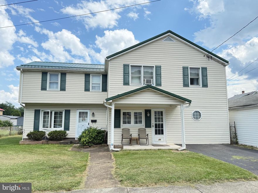 ATTRACTIVE 4 BEDROOM, 2 BATH CONVENTIONAL HOME ON DOUBLE LOT.  EXTERIOR FEATURES MAINTENANCE FREE VINYL SIDING, METAL ROOF, COVERED FRONT PORCH, CONCRETE PATIO IN REAR, VINYL DOUBLE HUNG WINDOWS, VINYL SHUTTERS, STORM DOORS, ALUM. FACIA, CONCRETE WALKWAY, PAVED DRIVEWAY & PARTIALLY FENCED. INTERIOR OFFERS LARGE LIVING ROOM W BOW WINDOW, FIREPLACE W DESIGNER BRICK, OVERHEAD LIGHTING AND W-W CARPETING.  KITCHEN W ALL APPLCS, BREAKFAST BAR, BRICK BACKSPLASH, ABUNDANT CABINETS AND LINOLEUM FLOORS.  SEPARATE DINING ROOM W WOOD PANEL WALLS, CHANDELIER & COMMERICAL CARPETING.  FAMILY ROOM W 3” OAK FLOORS. 2ND FLOOR INCLUDES 4 BEDROOMS PLUS NURSERY, 2 FULL BATHS, WOOD FLOORS & CARPETING.  FULL BASEMENT CONSISTS OF LAUNDRY ROOM W DRYER, UTILITY ROOM, 40 GALLON GAS HOT WATER TANK, GAS FURNACE, FREEZER, CONCRETE BLOCK WALLS, CONCRETE FLOORS AND DOOR TO ACCESS OUTSIDE. SOUNDS TOO GOOD TO BE TRUE!! SEE FOR YOURSELF.