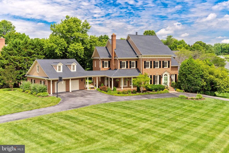 FANTASTIC VALUE at a NEW PRICE! With recent updates to the kitchen and other rooms,  this stately Potomac home has space for everyone in the family to live, work, and play. This property presents the perfect mix of sophisticated entertaining spaces as well as multiple family rooms and options for home offices so that the whole family can spread out! 8601 White Post Court in family-friendly McAuley Park features five bedrooms suites, a home office, an expansive lower level recreation room and game room, and a bonus room (652 sq. ft.) over the two car garage - perfect to use for virtual schooling or as a private creative space. The large deck and patio create great outdoor entertaining spaces! Gleaming hardwood floors, beautiful architectural details, and high ceilings complete this special home.  With a total of 6,542 square feet of living space on a 0.68 acre lot, this property is ideal for anyone seeking extra room! Showings by appointment.
