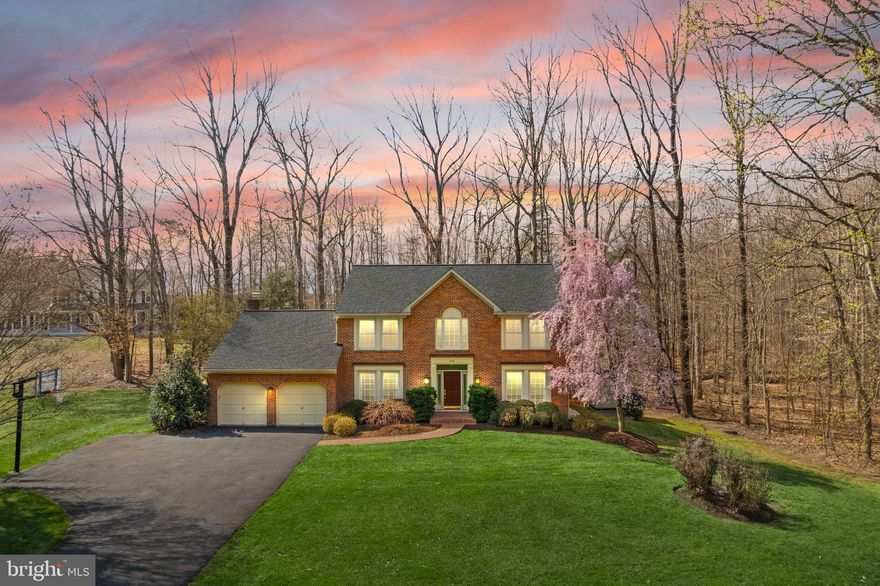 OPEN HOUSES: Thurs., April 9 5:30-7:30 PM; Sat., April 11 11 AM - 1 PM  *** Set on nearly 1.5 acres on a peaceful cul-de-sac in a sought-after Fairfax neighborhood within the Woodson High School pyramid, this beautifully maintained colonial offers nearly 4,500 square feet across three finished levels, combining classic design with thoughtful updates and inviting indoor-outdoor living.

The main level welcomes you with a spacious foyer entry and features hardwood floors. A formal, sunlit living room provides a bright and elegant space for entertaining or relaxing. A dedicated office is ideal for working from home. The formal dining room showcases classic moldings and a large picture window overlooking the expansive backyard, creating a beautiful setting for gatherings.

The kitchen features custom natural cherry cabinetry, updated countertops, tile backsplash, double ovens, a pantry cabinet, and an eat-in area with a charming bay window. The cooktop can easily be converted to gas. Just off the breakfast area, the family room offers hardwood floors, skylights, and a white-washed brick fireplace that anchors the space.

Step outside to the screened porch, designed for multi-season enjoyment with skylights, a ceiling fan, and a built-in bar, all overlooking the stone patio and private backyard. A powder room and convenient main-level laundry complete this level.

Upstairs, the primary suite offers a custom walk-in closet and a beautifully updated bath with marble counters, basket-weave tile shower, and a soaking tub. Three additional bedrooms with carpeting, two linen closets, and an updated hall bath with double sinks and granite counters provide comfortable accommodations.

The finished lower level, renovated in 2006, expands the home’s living space with a large recreation room, built-in entertainment center, recessed lighting, a granite-topped bar with dishwasher and refrigerator, a full bath with walk-in shower, bonus room, game closet, under-stair storage, and a large utility/storage room with built-in shelving.

The home sits on almost 1.5 acres and backs to trees. There is a two-car garage, plus ample parking in the driveway. Just down the road is Brentwood Park with a playground, pond, and walking trails.

Major updates include architectural shingle roof (2020), 6" gutters plus gutter guards, high-efficiency HVAC with humidifier (2021), exterior paint (2023), driveway repaved in 2024 and sealed in 2025, and most window glass replaced in 2023. A two-car garage and storage shed add additional convenience.

Offering generous space, thoughtful updates, and beautiful outdoor living areas, this exceptional property provides the perfect balance of comfort, functionality, and location in the heart of Fairfax. The location is unbeatable, with easy access to shopping and restaurants in Fairfax Corner, Fair Lakes and Fairfax City, and major commuting routes such as I-66, Rts. 29 and 50, and Fairfax County Parkway.
