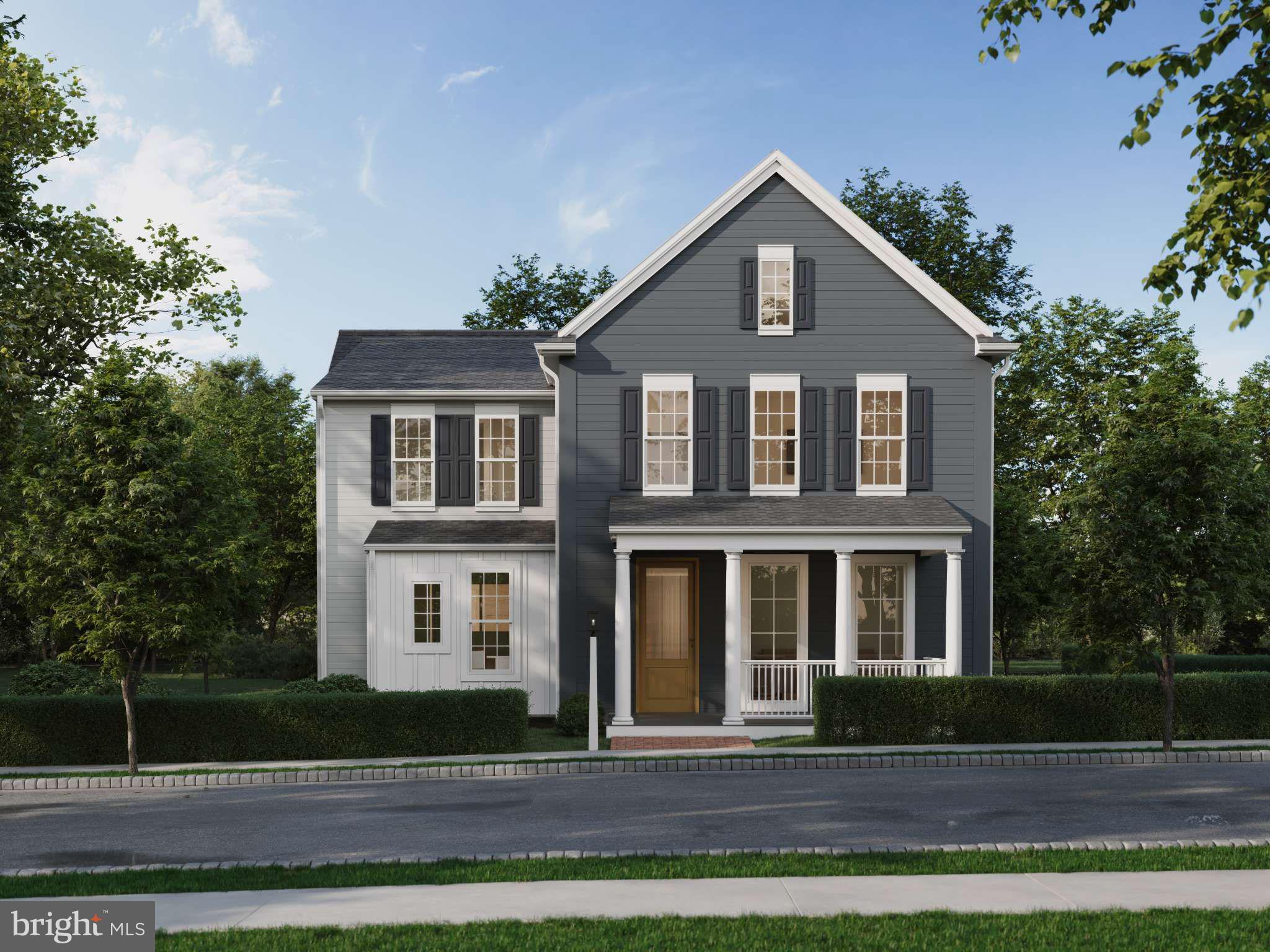 Welcome to the perfect blend of space, style, and smart design. This 6-bedroom, 4.5-bath home offers 3,680 square feet of flexible living in the desirable Cumberland Valley School District. From the oversized front porch, enjoy sweeping views of The Homestead and timeless curb appeal with Hardie Plank siding in Aged Pewter, white accents, bold black shutters, and lush landscaping. Inside, 9’ ceilings and 8’ doors elevate the space, while luxury vinyl plank flooring flows through the main level. The open-concept design connects a bright great room, dining area, and chef-inspired kitchen with two-toned cabinets, quartz countertops, walk-in pantry, and tile backsplash. An oversized eat-in island makes weeknight meals and weekend entertaining a breeze. A private first-floor bedroom with full bath offers an ideal guest or in-law suite. Upstairs are 5 more bedrooms and 3 full baths, including a junior suite with private bath and a luxurious primary suite featuring a spa-style shower, large-format tile, and walk-in closet. The lower level offers space for a game room, gym, or wet bar. Enjoy a laundry room with built-in cabinets and sink, plus an oversized backyard for relaxing or entertaining. Grange features preserved spaces including a wildflower meadow, green areas shaded by century-old trees, walking trails, and gathering spots perfect for connecting with friends old and new.