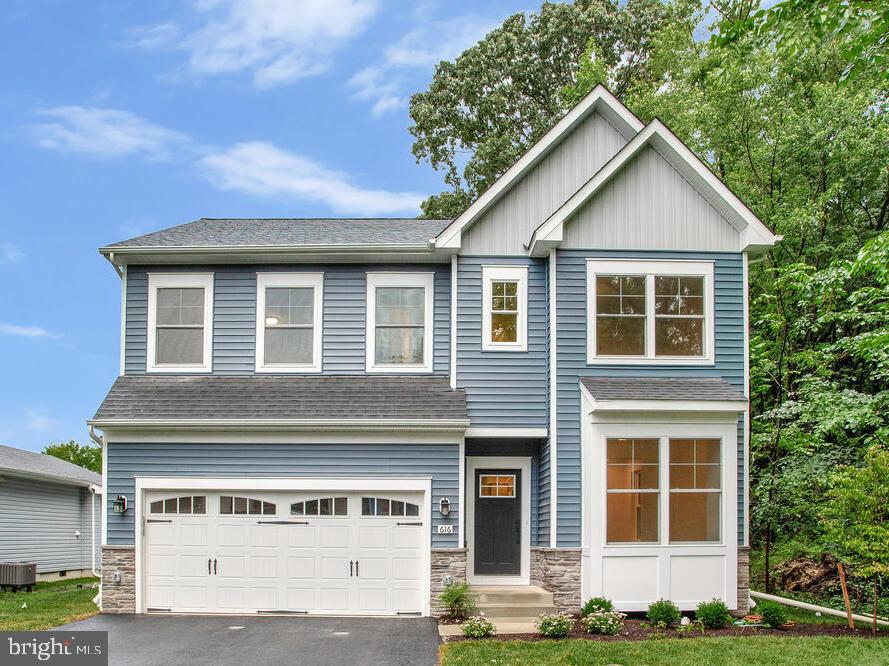 THIS HOME IS CURRENTLY UNDER CONSTRUCTION WITH THE EXPECTED COMPLETION DATE OF 7/31/2025.
Discover the Monroe — a beautifully crafted new construction home that blends modern comfort with timeless design.
Step into an open-concept layout that seamlessly connects the living room, dining area, and kitchen—an ideal setting for both everyday living and entertaining. A 2-foot cantilever extends the great room, providing additional space and enhancing the home's spacious feel.
At the heart of the home, a generous kitchen island invites casual dining and easy meal preparation. Outfitted with stainless steel appliances and ample cabinetry, this kitchen is designed to meet the needs of both daily routines and special gatherings.
A charming bay box window fills the front room with natural light, creating a bright and flexible space perfect for a home office, reading nook, or personalized retreat.
The owner’s suite offers a private sanctuary, complete with a walk-in closet and a luxurious en-suite bath—your own serene escape at the end of each day.
The basement includes a spacious finished recreation area with rough-in plumbing for a future bathroom, offering the opportunity to customize the space to your lifestyle.
Curb appeal is elevated by a stylish decorative garage door, adding character and charm to this thoughtfully designed home.
Disclaimer: All renderings/photos provided herein are for illustrative purposes only and are intended to showcase design options. Actual products, features, finishes, and layouts may vary. The images may depict optional features, upgrades, or configurations that are not included as standard or available in all homes.
