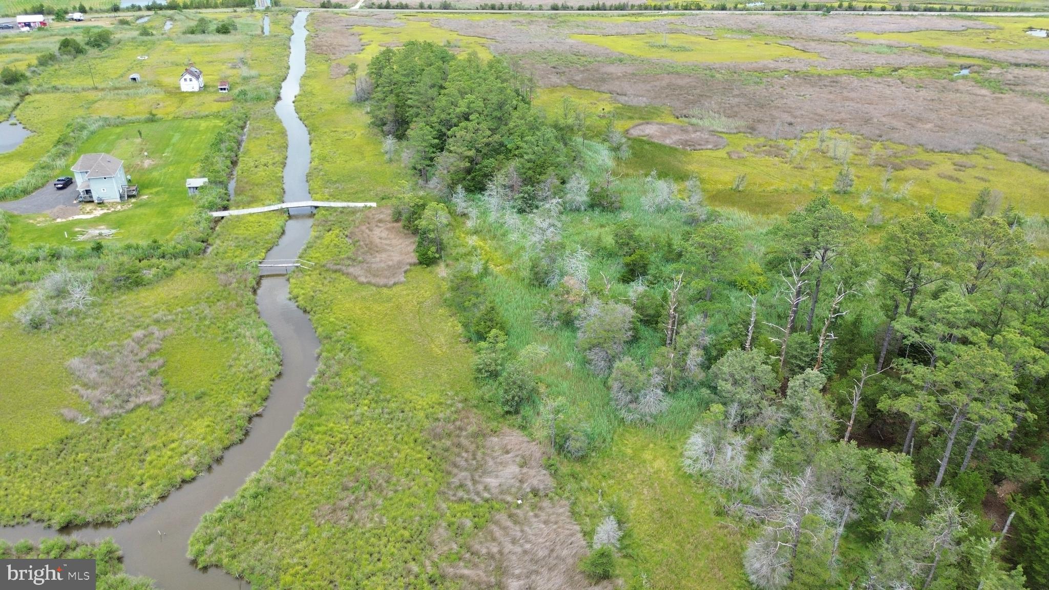 This is your opportunity to own 33+ acres of prime Sika deer land plus a fully renovated 2 bedroom, 2 full bath home combining modern comfort with rustic charm. Whether you are looking for a hunting getaway & basecamp or outdoor retreat, this property along with two adjoining parcels checks off all the boxes. Enjoy Sika & whitetail deer, duck & waterfowl right in your back yard! Walk across your private bridge to access two adjoining parcels with pond, loaded with sika deer trails throughout making this a truly turnkey set up for hunters and nature enthusiasts alike. Enjoy the gorgeous sunrises and sunsets, this property offers natural beauty, privacy, and abundant wildlife. This home offers rare convenience and unmatched access to the outdoors. Elijah's general store, marinas, blackwater refuge all conveniently located nearby, enjoy great fishing, crabbing, boating, biking and hunting!
This land can be purchased combined or all three parcels can be purchased individually. Buyer due diligence, see photos of surveys/plat, sdat and hunting apps appear to be incorrect.