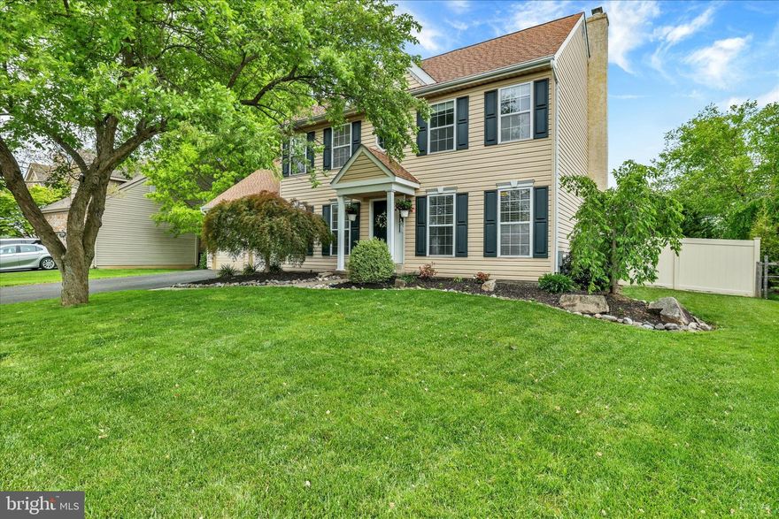 Welcome to 3901 Daystar Drive, an exceptional Barness-built “Aquetong” model nestled within the highly sought-after Hearthstone community and the award-winning Central Bucks Blue Ribbon School District. This beautifully appointed residence showcases a private resort-style backyard featuring an in-ground saltwater swimming pool with integrated spa and a fully fenced 6-foot privacy enclosure, creating the perfect setting for refined outdoor living and entertaining. An inviting two-story foyer welcomes you with newer luxury vinyl plank flooring and a gracefully turned staircase leading to the upper level. French doors open to the elegant formal dining room, highlighted by updated flooring and direct access to the kitchen for effortless entertaining. The formal living room offers random-plank luxury vinyl flooring, chair rail detailing, and custom beadboard accents, creating a warm and sophisticated atmosphere. The upgraded gourmet kitchen is thoughtfully designed with granite countertops, a large stainless-steel undermount sink, subway tile backsplash, soft-close cabinetry and drawers, recessed lighting, and a full suite of stainless-steel appliances including a Samsung electric range, Whirlpool microwave and dishwasher, and LG refrigerator. The adjoining breakfast area is filled with natural light from an expansive bay window overlooking the backyard oasis. The spacious family room serves as the heart of the home, featuring a dramatic floor-to-ceiling brick fireplace with raised hearth and wood mantel. Oversized windows and a sliding glass door bathe the space in sunlight while providing seamless access to the expansive deck, paver patio, and pool area. A well-designed mudroom with custom bench seating, storage cabinetry, shelving, and a conveniently located powder room completes the main level. Upstairs, the luxurious primary suite offers a peaceful retreat with two walk-in closets, an additional shoe closet, vaulted ceiling detail, and ceiling fan. The spa-inspired primary bath features a granite-topped vanity, whirlpool soaking tub with ceramic tile surround, and a spacious walk-in double shower with ceramic tile walls. Three additional generously sized bedrooms and a beautifully updated hall bath with granite vanity, diagonal ceramic tile flooring, tiled tub/shower surround, and linen closet complete the upper level. The finished lower level expands the home’s living space with a sprawling 26’ x 18’ recreation room featuring Berber carpeting, recessed lighting, electric heat, built-in storage cabinetry, shelving, and closet space. Additional areas include a substantial storage/utility room and a dedicated laundry and craft room. Designed for both relaxation and entertainment, the private backyard retreat features an expansive deck, EP Henry paver patio, spacious saltwater pool and spa, and a large storage shed for pool and garden equipment. Ideally situated within walking distance to Hansel Park and conveniently close to Bush and Holicong Parks, historic Doylestown and New Hope, fine dining, boutique shopping, museums, theaters, and the SEPTA station, this remarkable home also offers convenient access to New Jersey, Philadelphia, and New York City. This is a rare opportunity to own a beautifully upgraded home in one of Bucks County’s most desirable communities.