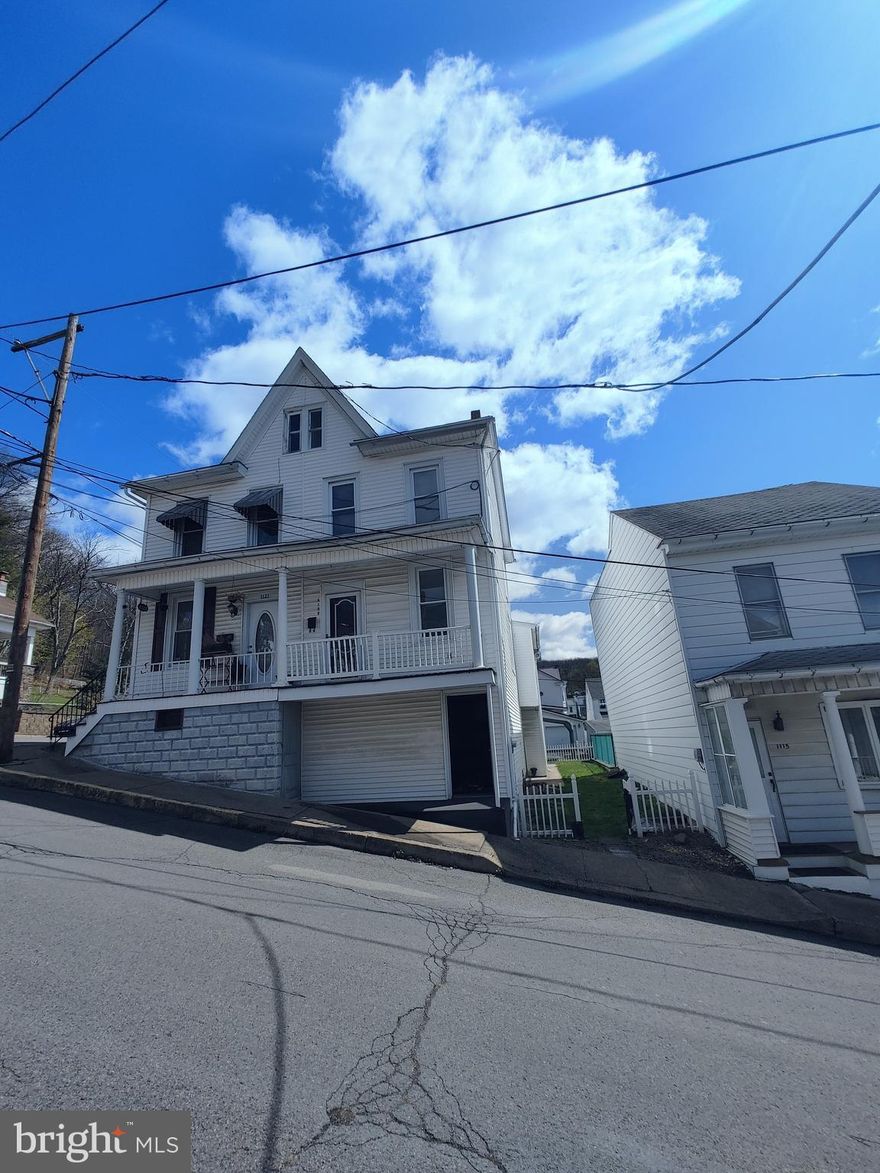 Are you seeking an updated family size home with updates and parking in the City of Shamokin? Located at 1119 N Franklin St in Shamokin, PA 17872, this well-maintained half-double home offers 4 bedrooms and 1 bathroom across 1,454 sq ft of living space. The property features a fenced yard, off-street parking, and a lower-level walk-out basement with a small patio and upper deck. The basement includes another room for a family room or additional bedroom. Updates include new heating furnace, roofing updates, flooring updates and fresh paint.