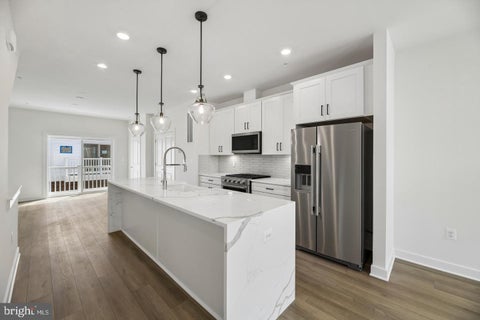 Photo of 2042 Henson Norris Street, ROCKVILLE, MD 20850 (MLS # MDMC2257854)