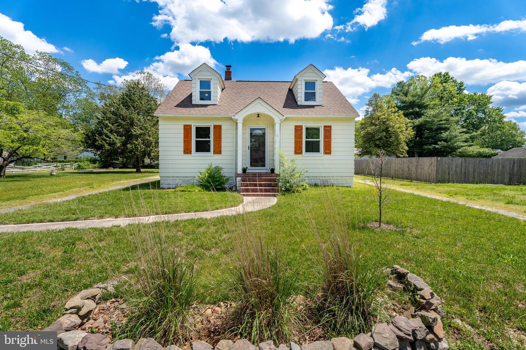Welcome to this recently renovated 4-bedroom historic bungalow that perfectly blends vintage charm with modern updates. Major upgrades include a new roof, new windows, updated kitchen, updated full bathroom, fresh paint both inside and out, and beautifully refinished original hardwood floors that add warmth and character throughout the home. Inside you'll find cozy, light-filled spaces that feel both welcoming and functional. The updated kitchen is perfect for home chefs, while the refreshed full bathroom offers both style and functionality. The main level is completed by a new washer and dryer with custom butcher block folding station, cabinets for additional storage, and a half bathroom. Upstairs you'll find two more large bedrooms with adorable window seats with hidden storage underneath and an oversized original cedar-lined closet! A partial basement below provides bonus storage complete with a new sump pump and custom french drain system. Step outside and enjoy the generous outdoor space this partially fenced, double lot, has to offer. Enjoy the convenience of a circular driveway for easy access, plenty of parking, plus a detached two-car garage complete with electric; ideal for a workshop, art studio, or additional storage. The back patio is ready for summer cookouts and evening hangouts under the pergola with glowing string lights creating the perfect backdrop for laid-back summer nights. Set on almost half an acre, you get all of the perks of city water and sewer without the city taxes! This property is conveniently located close to the Wicomico Youth and Civic Center, Salisbury City Park and Zoo, and the famous playground: Ben's Red Swings, all just a little over a 1 mile away. Close to Salisbury University, Tidal Health Peninsula Regional Hospital, coffee shops, grocery stores, shopping, and just a half hour from the beach; this location can't be beat! Whether you're a first-time homebuyer, downsizer, or investor, this move-in ready gem is full of personality and potential. Book your private tour today!