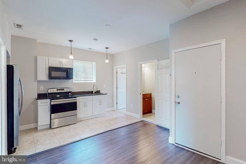 **Charming, Updated 1 Bed/1 Bath in Vibrant Station North!**
Live in the heart of Baltimore's arts and entertainment district at 2206 Charles Street - Unit 6! This recently renovated apartment features a modern open floor plan with beautiful hardwood floors, a newly updated eat-in kitchen with stainless steel appliances (including a refrigerator and microwave!), and the convenience of in-unit washer/dryer. Enjoy central heat and air conditioning for year-round comfort. Pets are negotiable with a deposit ($150) and monthly fee ($30/$50 depending on size). Street parking available. Tenant responsible for gas, electric, and water/sewer. One year lease.
**Rent: $1,200/month**
**Deposit: $1,200**
**Available Now!**
