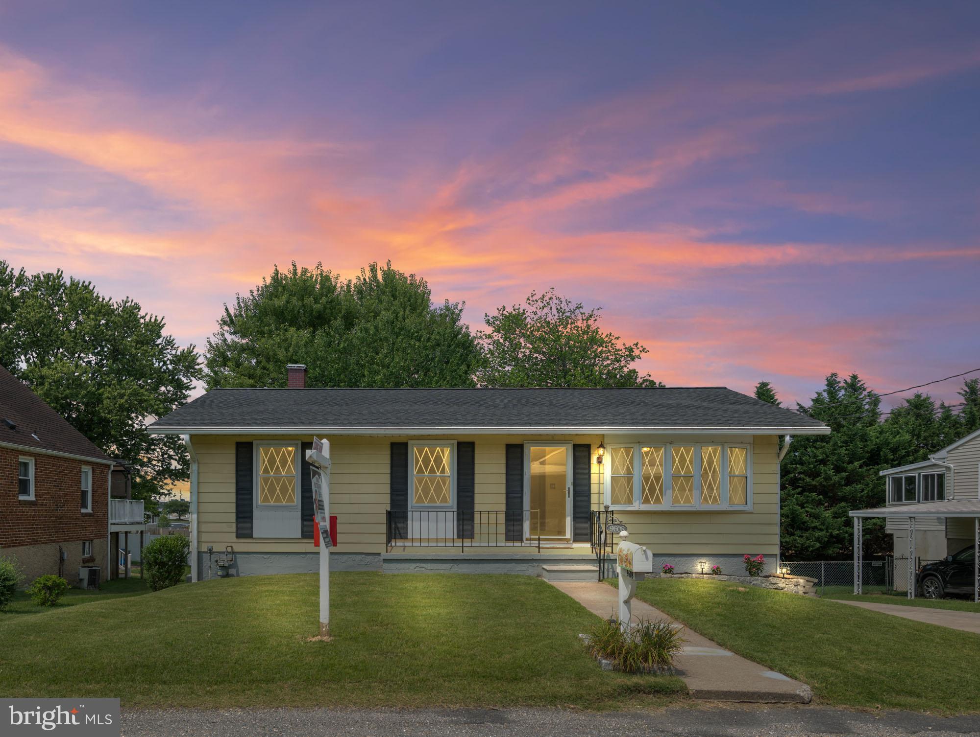 Welcome to this well-maintained rancher nestled in the heart of Parkville, Maryland. From the moment you arrive, the fresh landscaping and newer architectural shingle roof (2022) make a lasting first impression. Relax and unwind on the inviting front porch before stepping into the spacious living room, where updated water and scratch-resistant luxury vinyl plank flooring and a large bay window fill the space with natural light.
Just beyond, the separate dining area features hardwood floors, a second bay window, and a ceiling fan, offering a perfect setting for gatherings. The adjacent kitchen is equipped with stainless steel appliances, including a gas range and a double-door refrigerator with water dispenser and ice maker. It also boasts painted cabinetry, new laminate countertops, mosaic tile backsplash, updated flooring, and space for a cozy breakfast table.
Three generously sized bedrooms, all with hardwood flooring and ceiling fans, share a full hall bath featuring a spa-like safe step tub. A side entrance off the kitchen provides easy access for unloading groceries, and a coat and linen closet add extra convenience.
The partially finished walk-out lower level offers great additional living space with two brand-new windows, a freshly updated half bath with new vanity and toilet, a full-size washer and dryer including a Whirlpool front loader, ample storage, and freshly painted walls sealed with DryLok. Step outside to a large, shaded, fully fenced yard—perfect for entertaining, gardening, or simply relaxing outdoors.
Additional updates and features include a 2019 HVAC system, 2019 tankless water heater, sump pump, four glass block basement windows, an extended driveway, and plenty of electrical outlets throughout the home.
Ideally located just off Joppa Road, this home is minutes from shopping, dining, and major commuter routes. With just a few cosmetic updates, this charming home offers tremendous potential. Homes in this location don’t last—check out the 3D virtual tour and schedule your exclusive showing today!